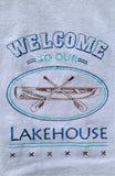 "Welcome to our Lakehouse"  Towel