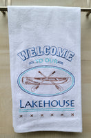 "Welcome to our Lakehouse"  Towel