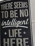 Metal sign - "THERE SEEMS TO BE NO intelligent LIFE HERE"